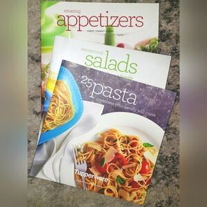 Set of 3 Tupperware Cookbooks with recipes in English, Spanish and French.